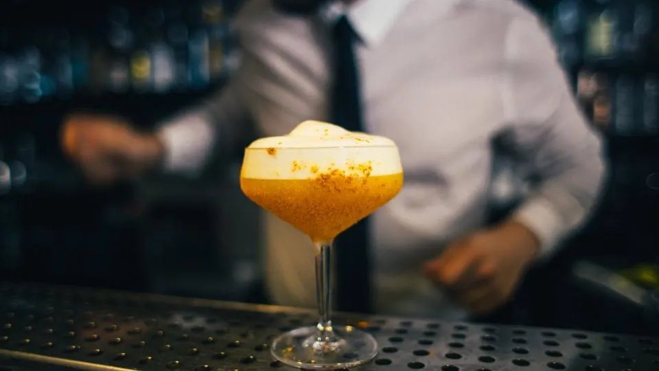 Cocktail served on a bar counter, where beverage syrups for bars help keep recipes consistent
