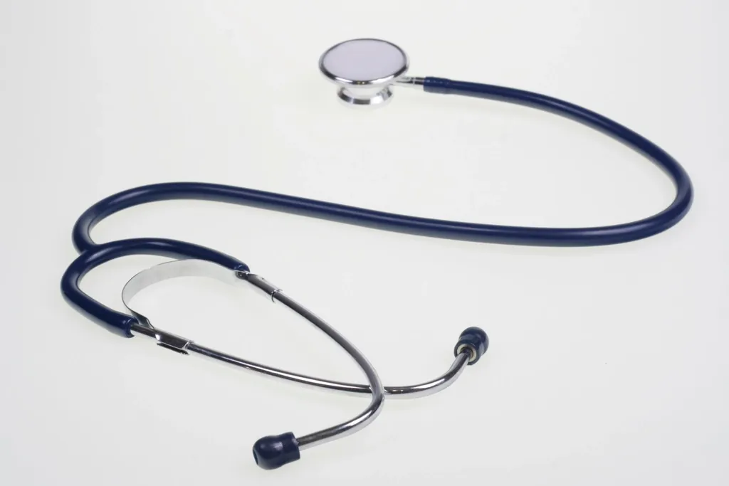 Stethoscope lying on a plain white surface