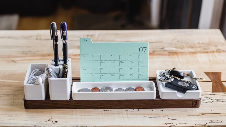 Desk calendar card in a wooden organizer, a simple start for a small business content calendar