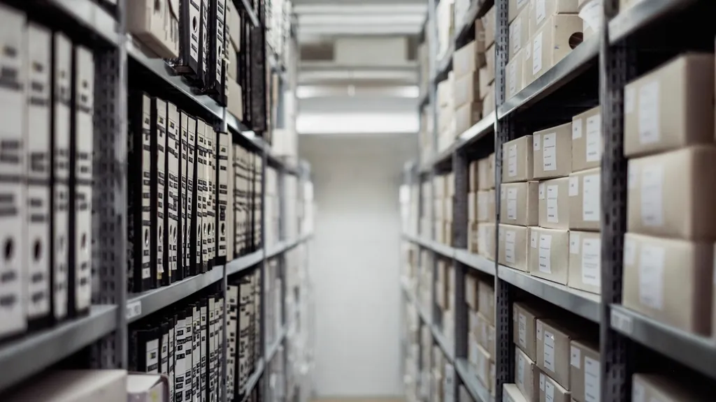Archive shelves full of records boxes, the kind of files a white collar investigation in NJ may reach
